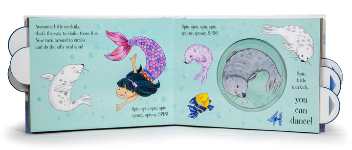 these inner pages show the mermaid and dancing with a seal. the tab will pull the seal to dance on the page. 