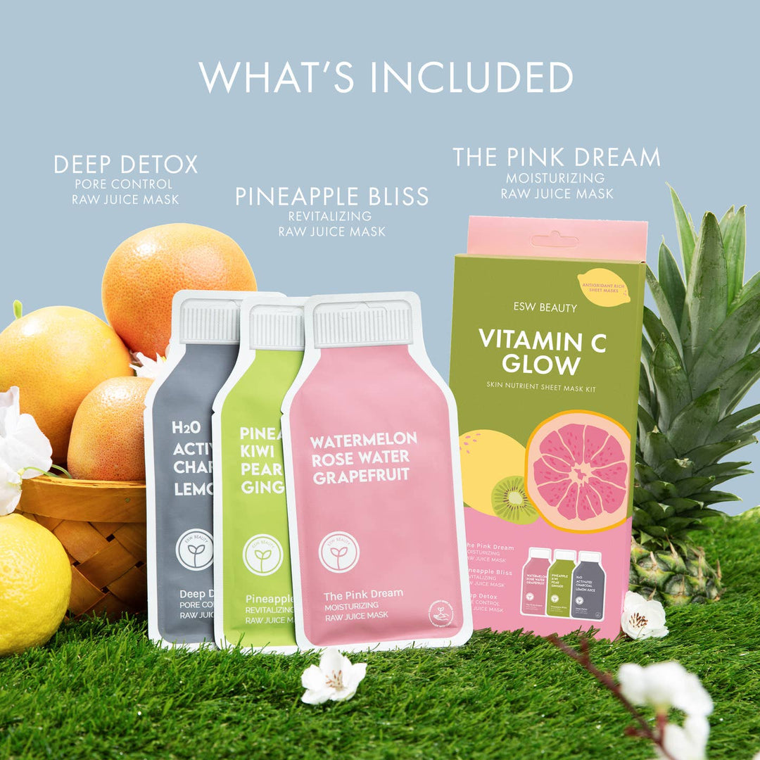 Collection of raw juice mask packages with fruits and a pineapple on a grassy background
