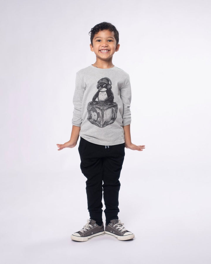 Child wearing a gray sweatshirt with a graphic design on a white background