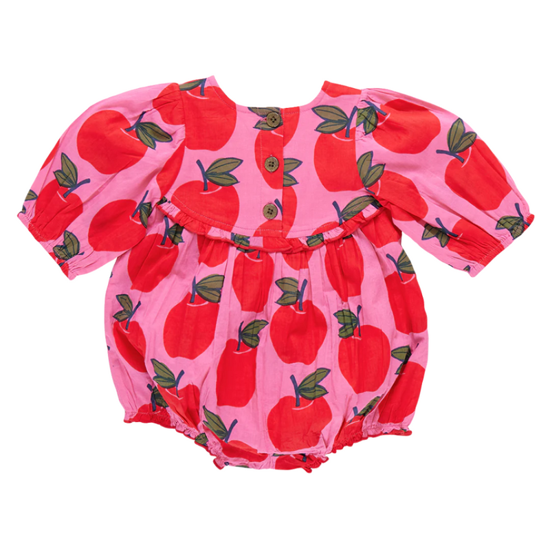 3/4 sleeve baby bubble, this is a view of the back. 3 glitter buttons on the back from the top.  bright pink background color with big red apple print all over. small ruffle at the empire waist. 