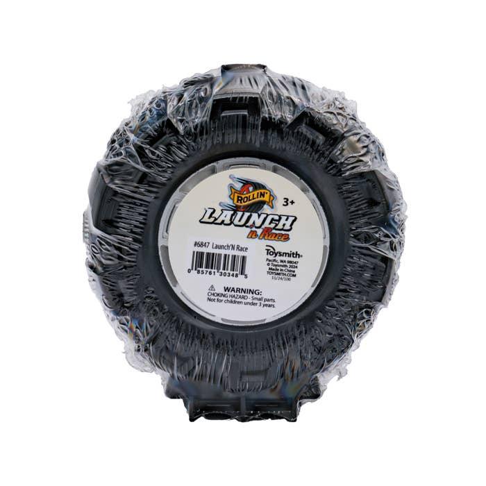 this shows the back of the tire and the sticker on the back of the car. 