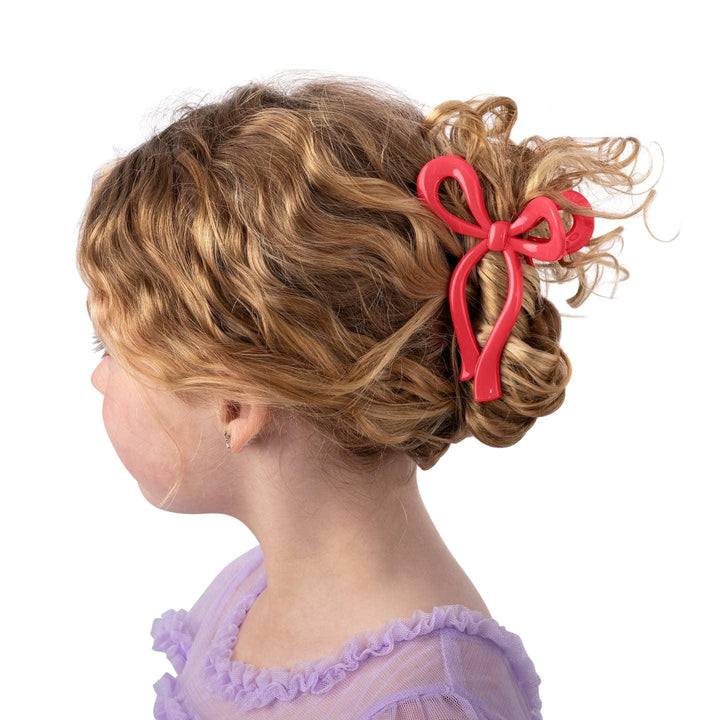 little girl's hair clipped up with the claw clip