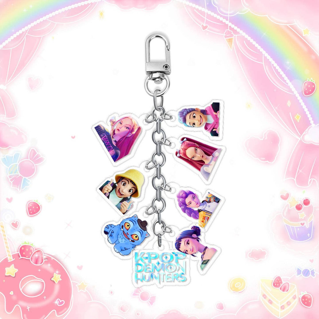 Keychain with kpop demon hunter cartoon character charms on a colorful background