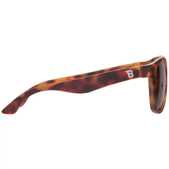 Sunglasses with tortoiseshell frame and logo on a white background