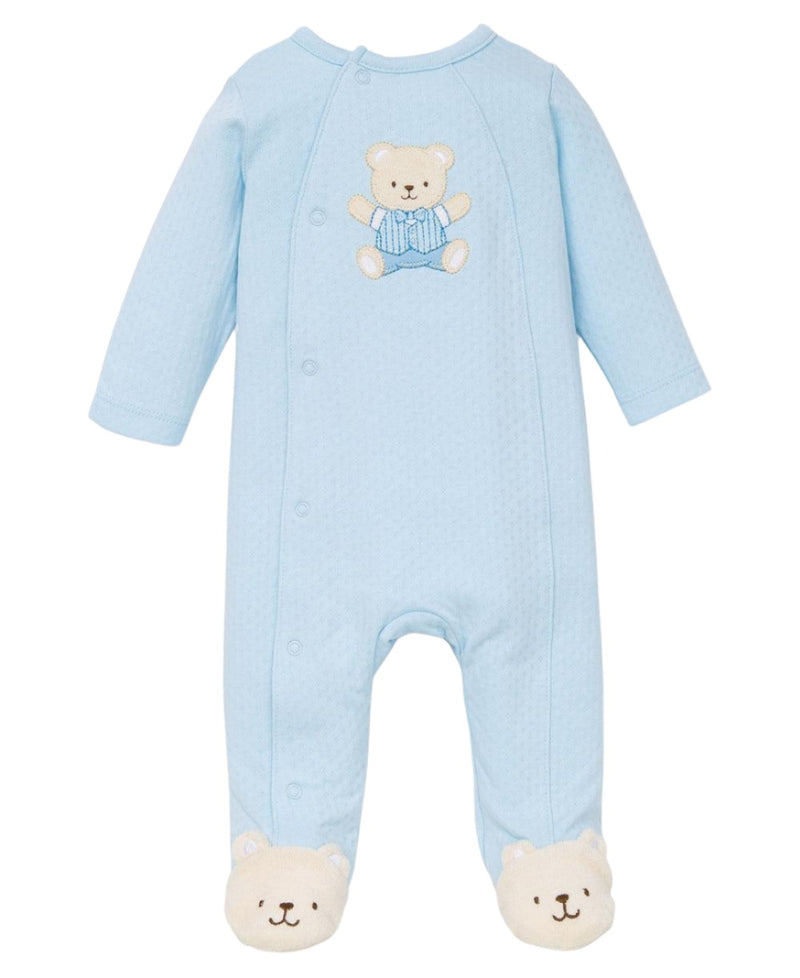 footed onesie in blue color, teddy bear feet and a small teddy bear embroidered on the center