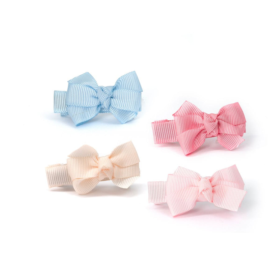 little fabric bows in a set of 4: light blue, beige, coral and light pink. 