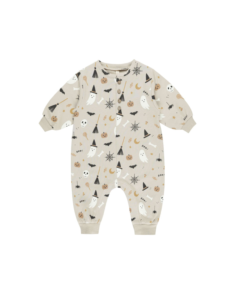 baby jumpsuit with all over halloween print including: ghosts, bone cob webs, brooms and skull- all drawings are cartoon like and cute not scary. 