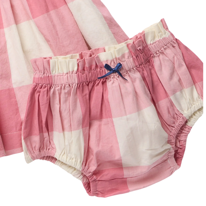 Pink and cream gingham baby bloomers with an elastic waistband and a small blue bow, shown on a white background.