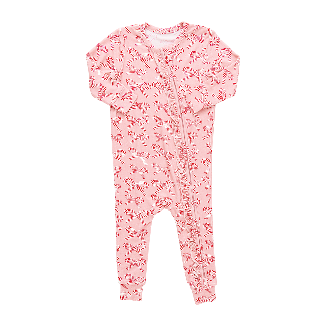 Pink baby onesie with candy cane pattern on a white background