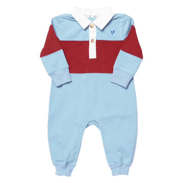 A baby long-sleeve colorblock romper in light blue, burgundy red, and white, featuring a white collar with two decorative buttons and a small embroidered blue rooster logo on the chest.