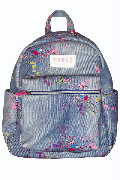 Scuba material backpack, zipper on front pocked and two side gussets. small handle on top of the back. denim color with splatter paint all over the back. two shoulder straps in back of bag. 