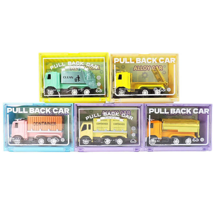 Five small toy dump truck sets in clear plastic cases, each with a different colored case and truck, arranged on a white background. The cases are light blue, yellow, yellow, purple, and purple.