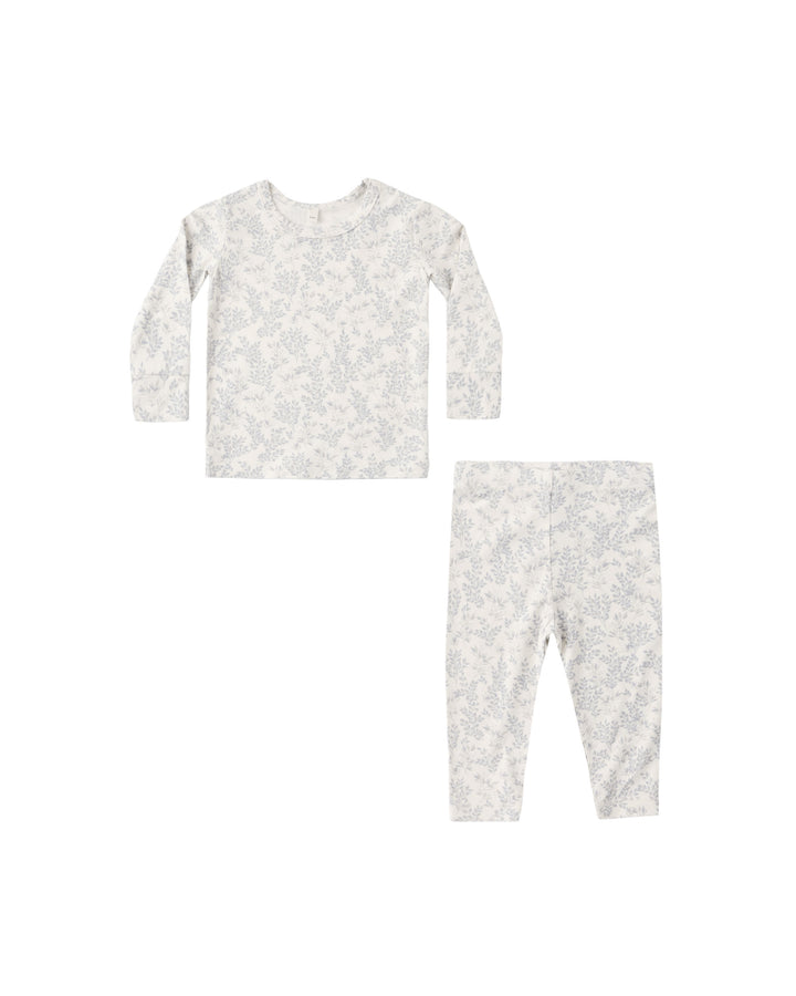 Children's pajama set with long-sleeve top and pants on a white background