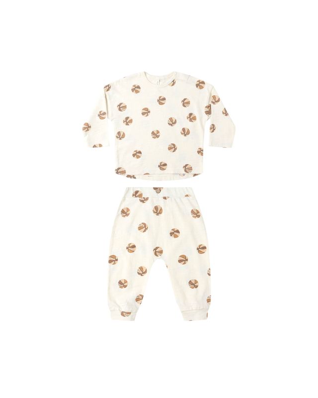 Baby outfit with long-sleeve top and pants on a white background