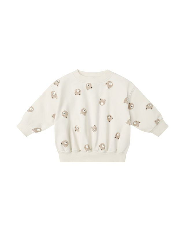 White sweatshirt with decorative bears on the sweatshirt