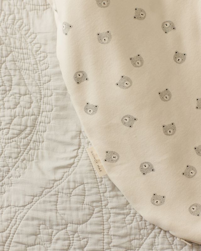 Close-up of textured fabric with a bear pattern on it 