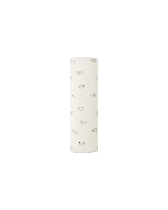 baby swaddle in cream color with tiny bears on it 