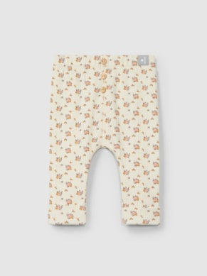 baby pants, beige with light pink floral design all over