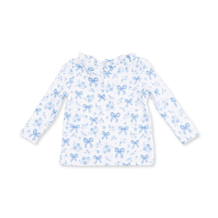 the top to a 2 piece set in a white color with light blue bow and flower print. 