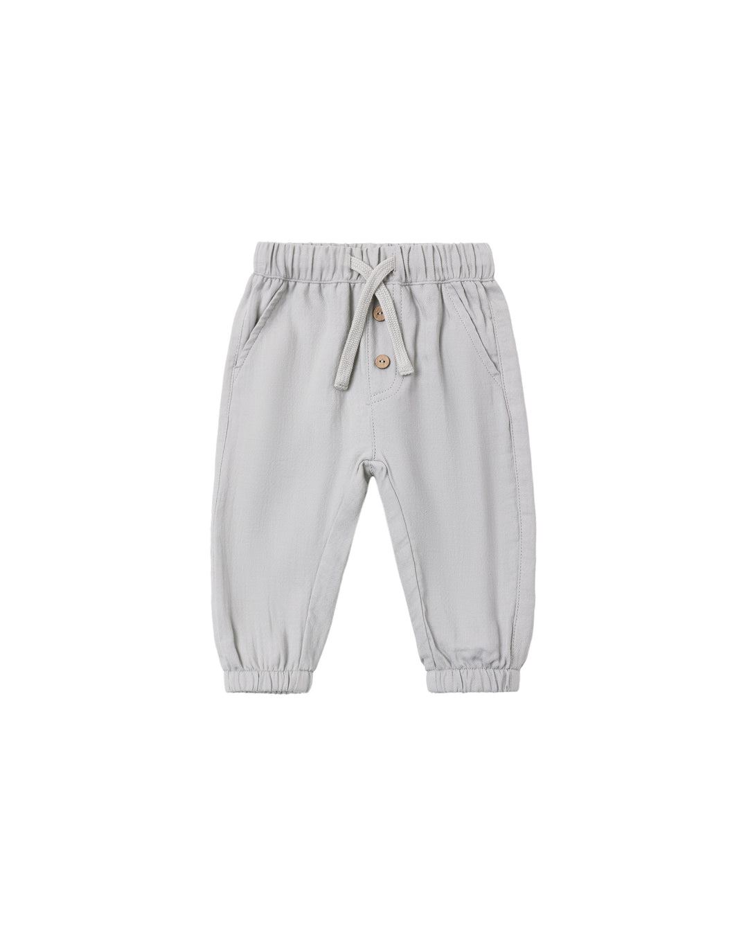 A pair of light gray jogger pants for toddlers, featuring an elastic waistband with a drawstring, side pockets, and elastic cuffs at the ankles, shown against a plain white background.