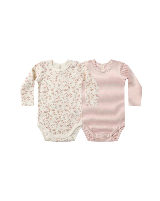 Two baby bodysuits, one with floral pattern and the other with pink stripes, on a white background.