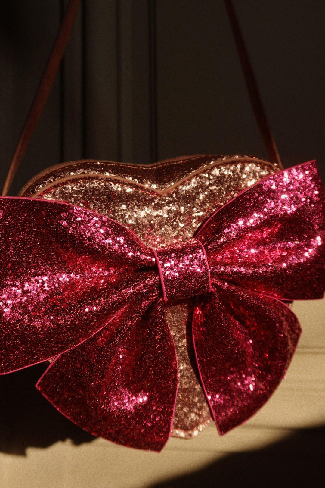 close up of bow bag in the twilight as the light hits the sparkles. 