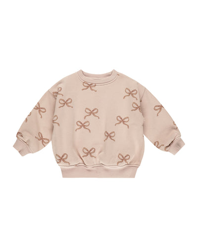 dusty rose sweatshirt with cinnamon bows all over the sweasthirt