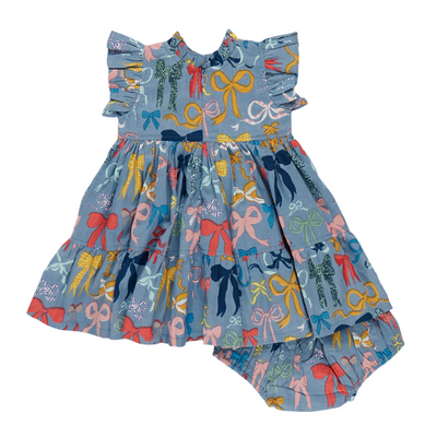 This dress has a hidden zipper in the back of the dress. Light blue ground color with multi colored bows all over the dress: yellow, pink, red, orange, white and navy. 