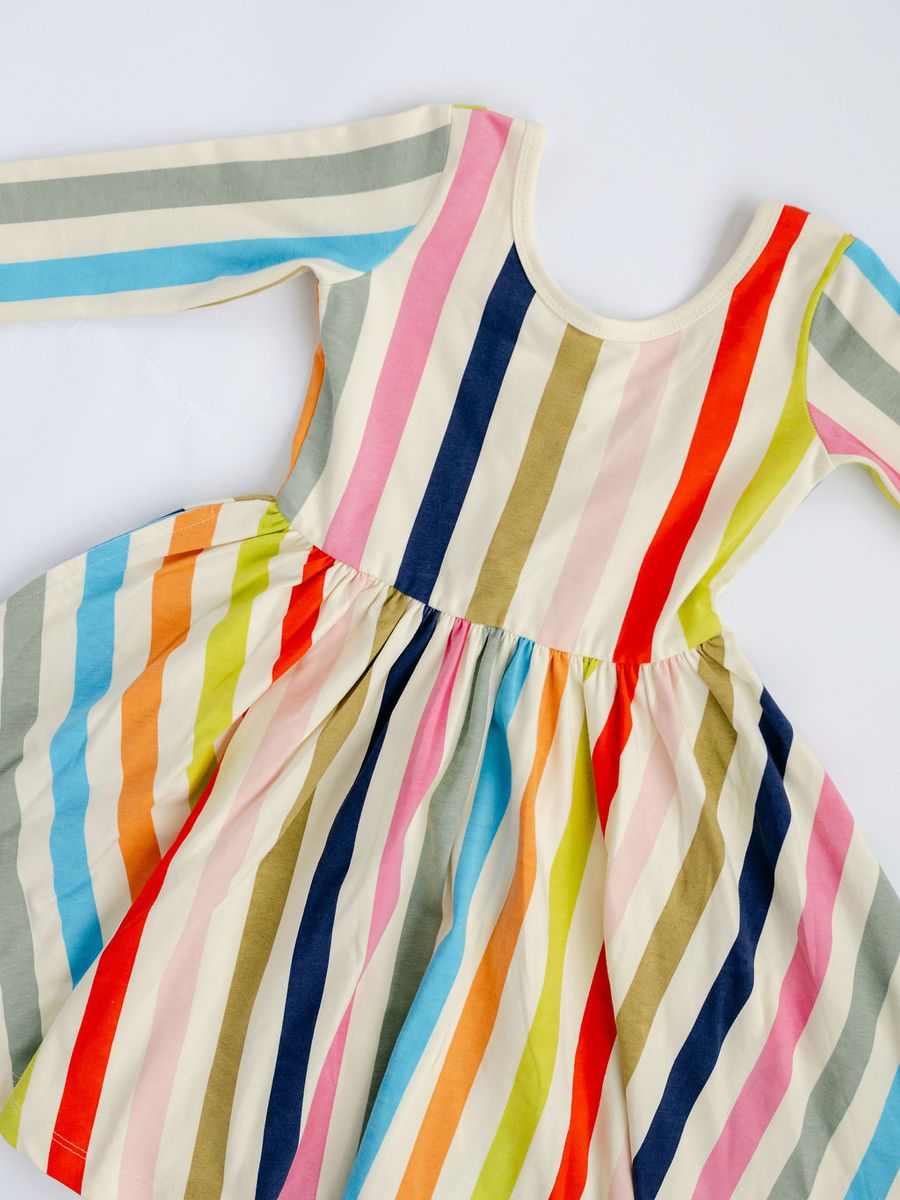 Colorful striped dress on a white background