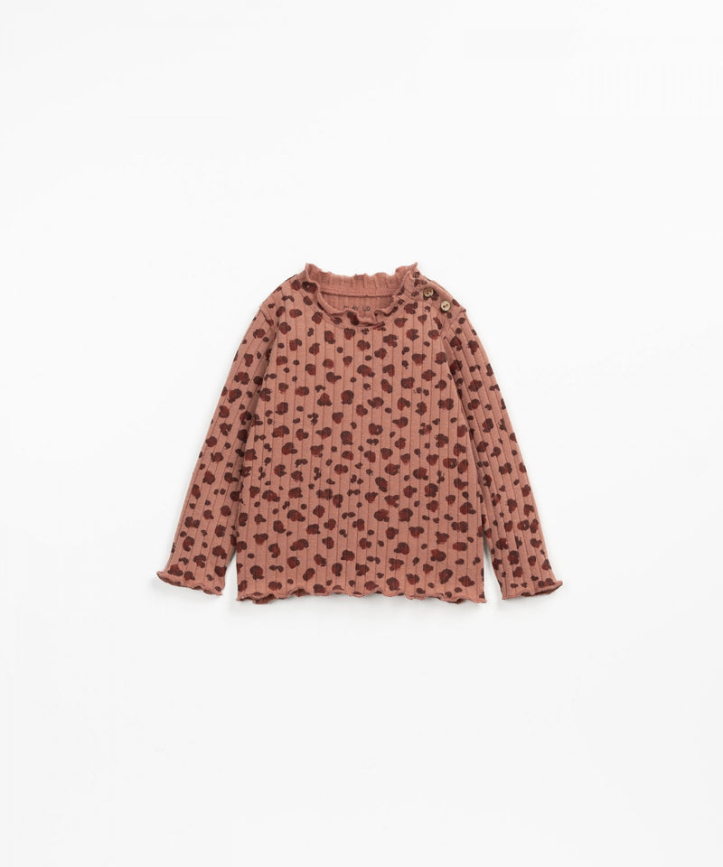 baby long sleeve tee, leopard print in brown color with navy and rust colored spots. 