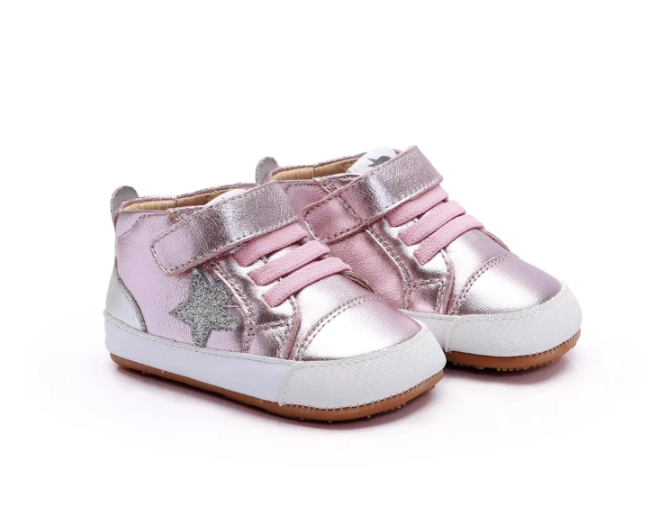 A pair of toddler high-top sneakers in metallic pink and silver, featuring hook-and-loop straps, a glittery star detail on the side, and white rubber soles.