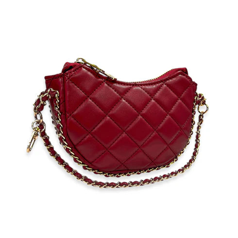 Burgundy quilted handbag with gold chain strap on a white background