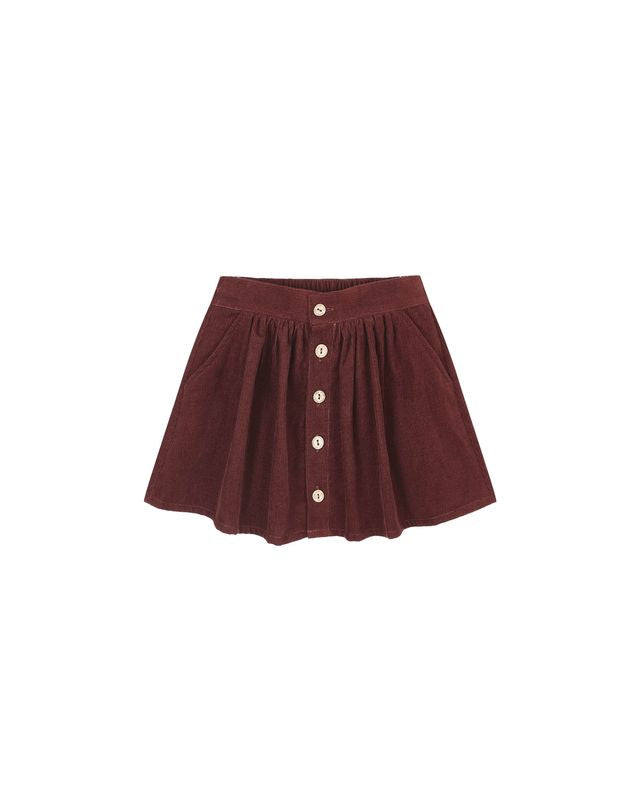 burgundy skirt with button details on a white background