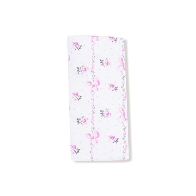 Floral patterned burp cloth on a white background