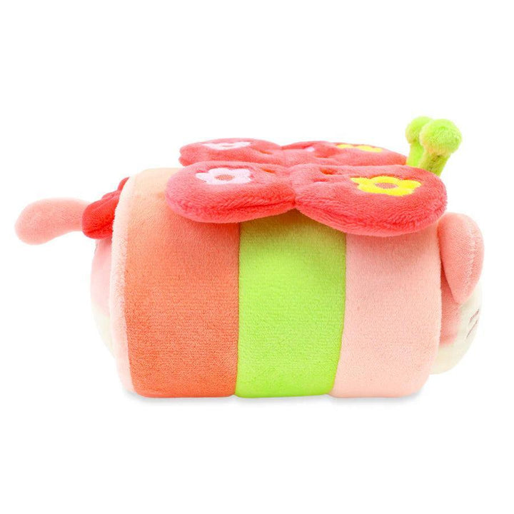 sideview of kitty, kitty wears a butterfly outfit. butterfly outfit is detachable. tail of kitty has a red bow attached. 