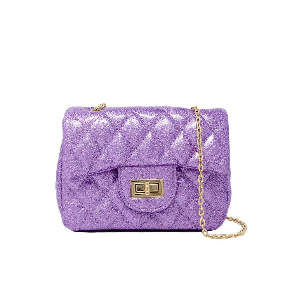 quilted purple glitter handbag with front push lock and gold linkchain. 