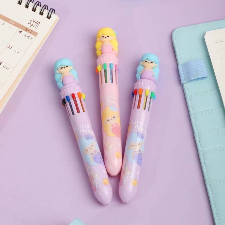 mermaid pens. one pen pink with blue hair mermaid and the other pen lavender with blue hair mermaid 