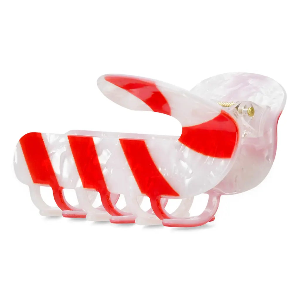 A four-piece claw hair clip set made of translucent white and red resin, shown on a solid white background.