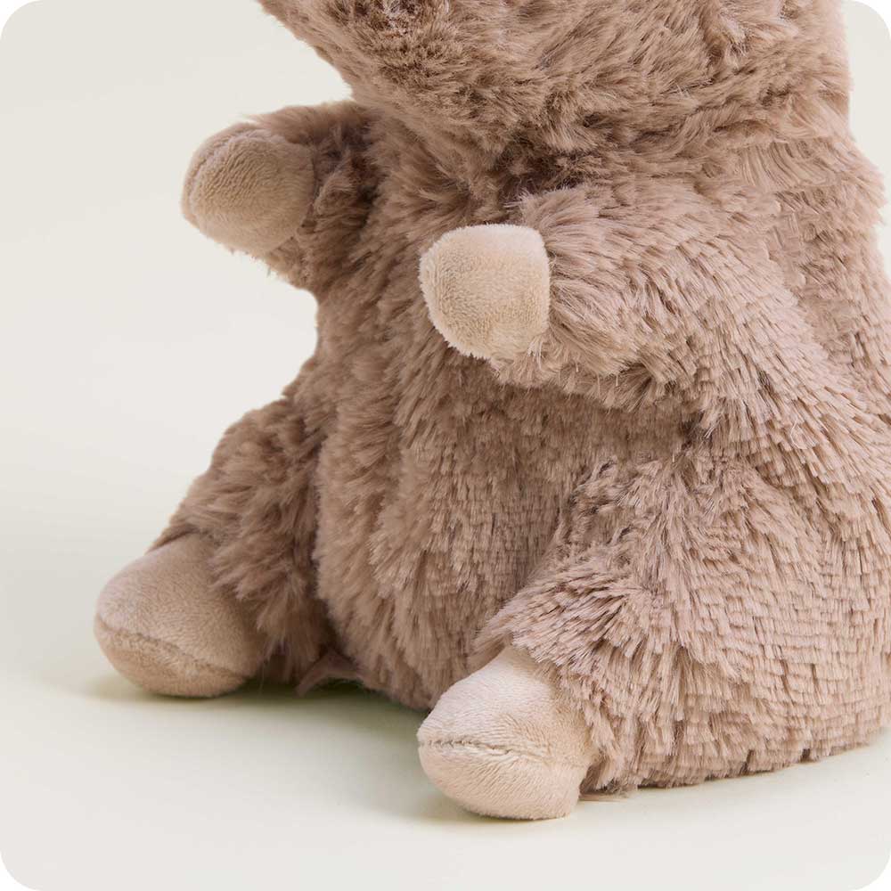Plush toy resembling a moose on a white background