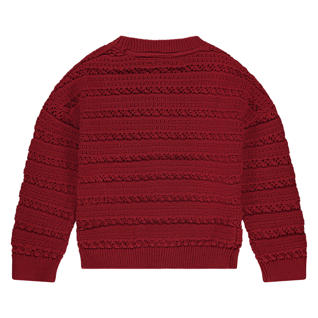 back of Red knitted sweater on a white background