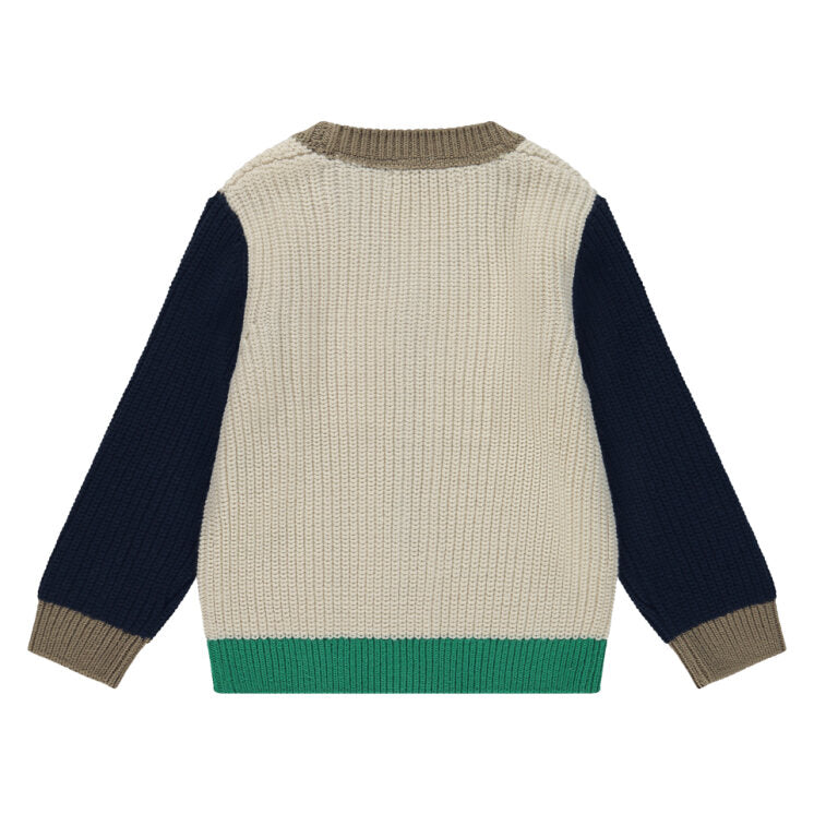 Back view of a children's sweater with color-blocked design on a white background