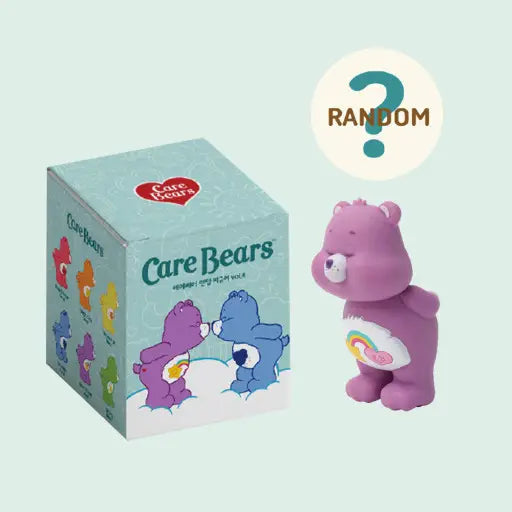 Care Bears toy figure next to its packaging on a light blue background