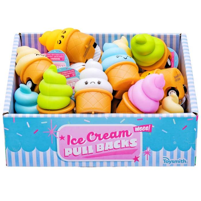 assorted ice cream pull back toys in different colors. each ice cream has a funny face on it, happy, sad, mad or sleepy