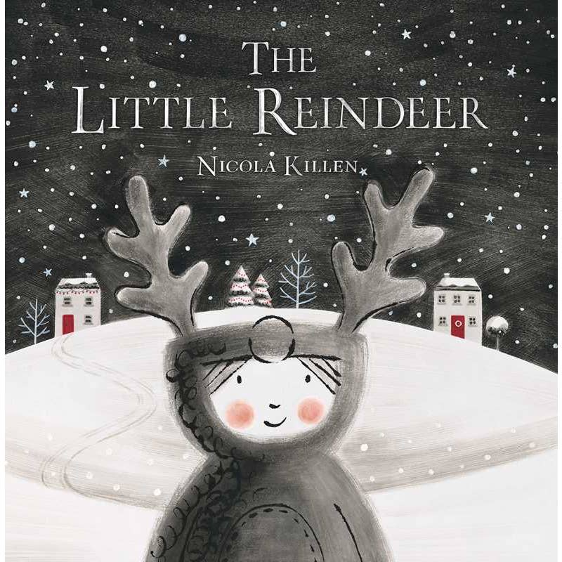 Hardcover Book with a child dressed as a reindeer with snowfalling in the background.