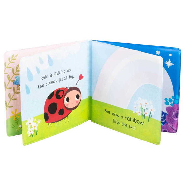 Open children's book with a ladybug illustration on a white background
