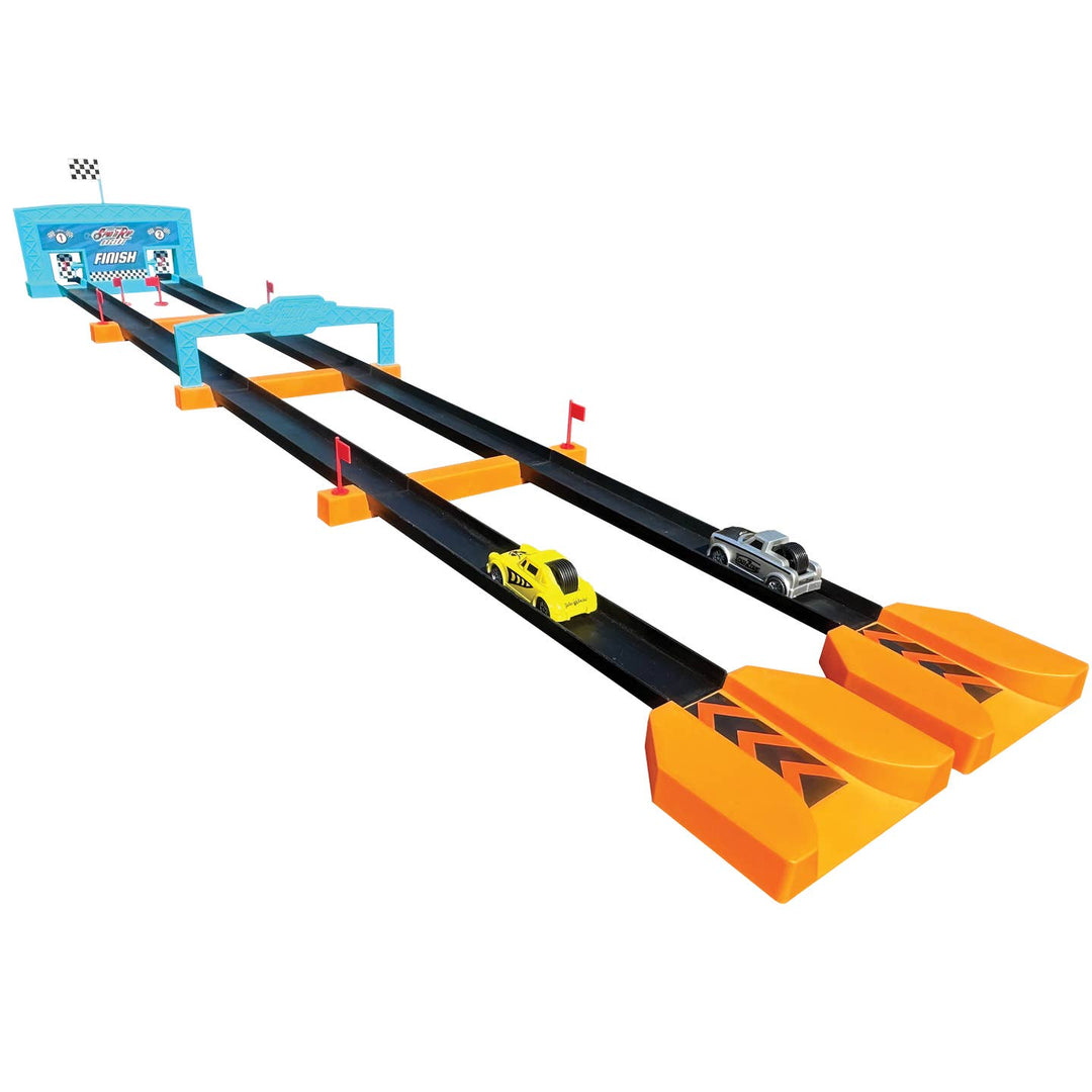 Toy race track set with two cars on a white background