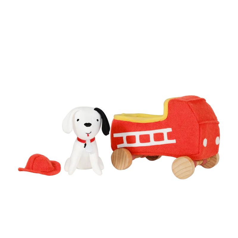 this picture shows all three pieces to this toy: dog hat, dog and fire truck