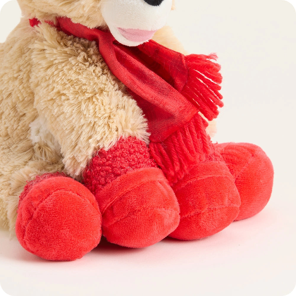 Plush reindeer with a red scarf on a white background