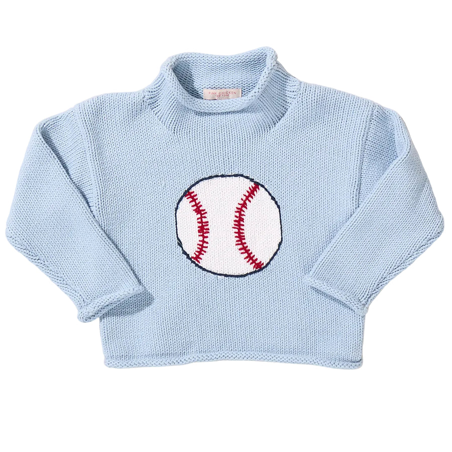 Light blue sweater with a baseball design on a beige background