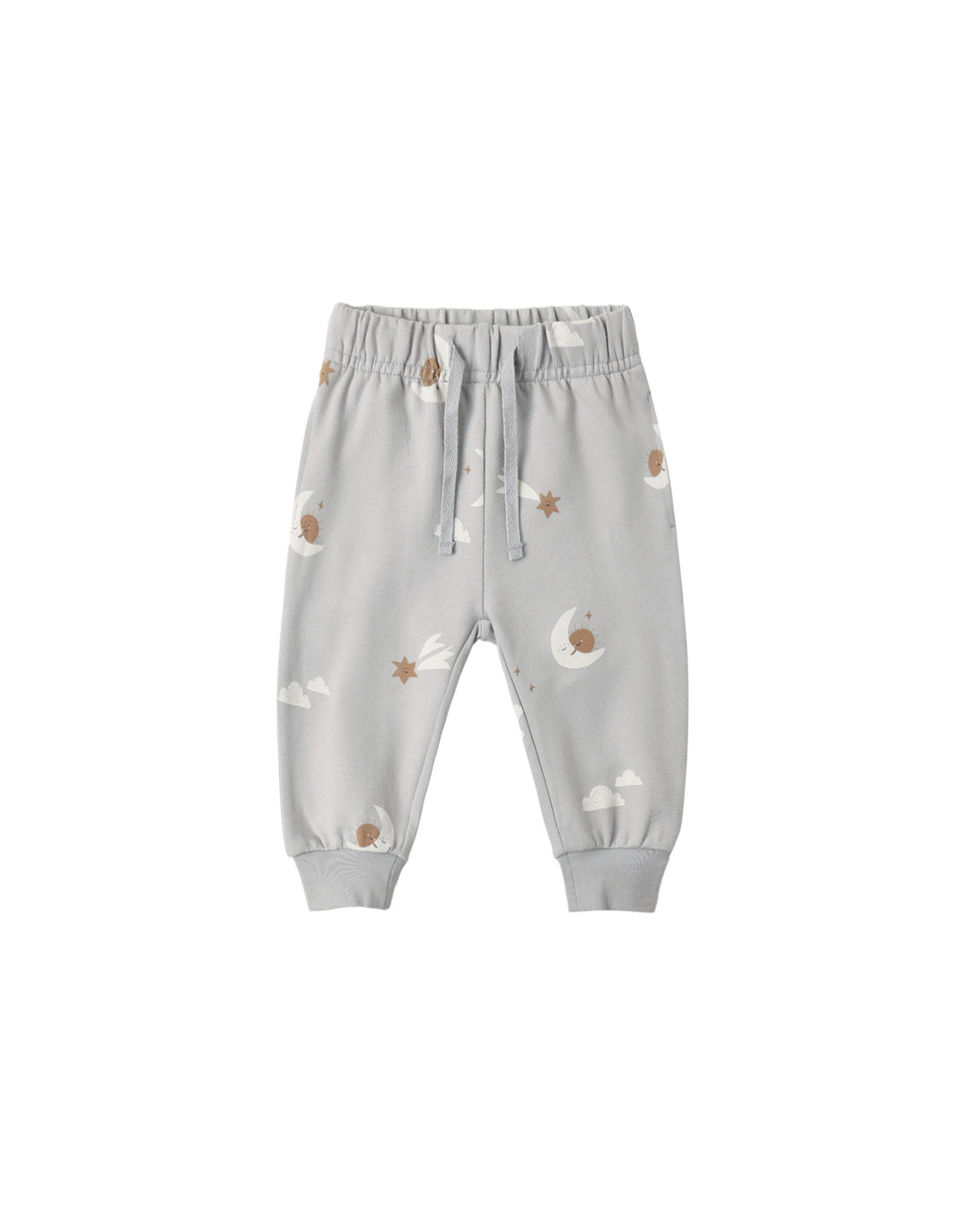 Light gray baby jogger pants with an all-over celestial print of crescent moons, stars, and clouds, featuring an elastic waistband with a drawstring and ribbed ankle cuffs.